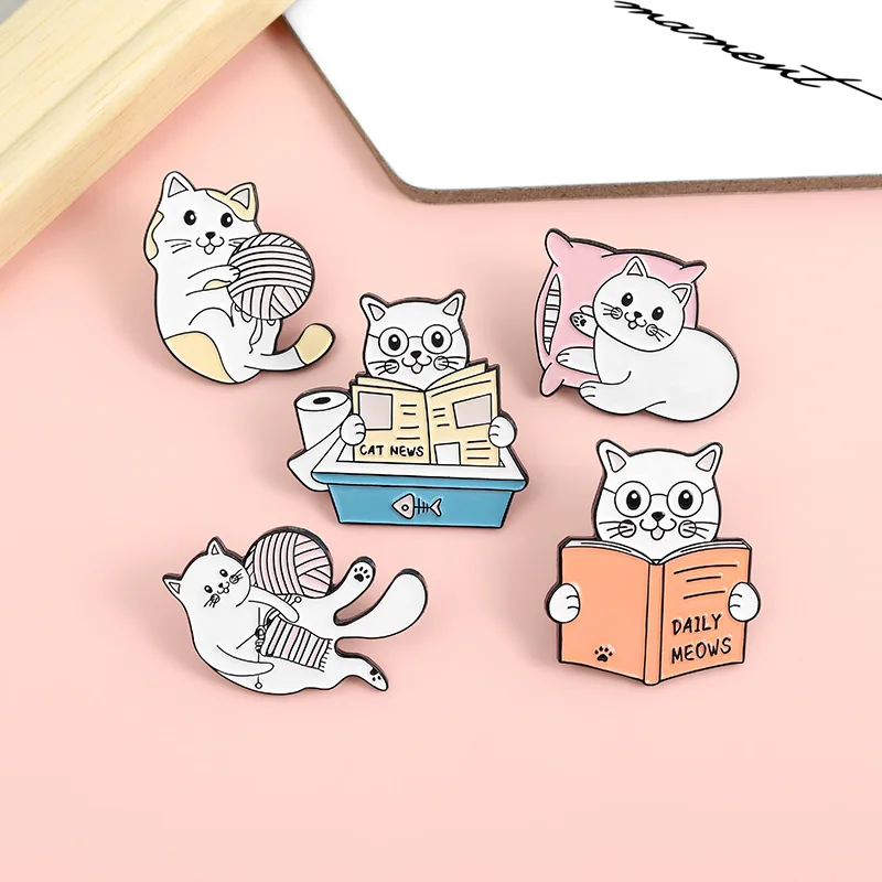

Cat's Daily Enamel Pin Custom Cat Kitten Knitting Reading Playing Pillow Brooches Bag Lapel Pin Animal Badge Cute Jewelry Gift
