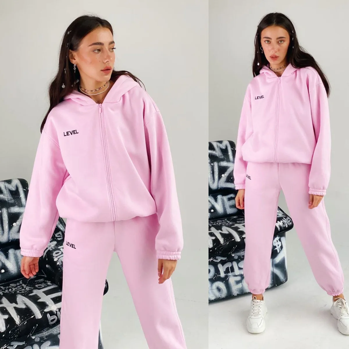 

2021 European and American autumn and winter women's new style hooded sports solid color casual trouser suit women