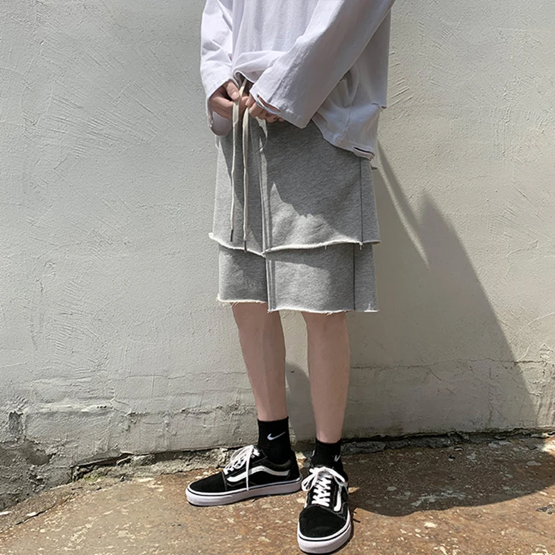 

Casual hip hop drawstring men's pants elastic Harajuku wind ins two piece 5-point pants shorts summer trend fake loose youth