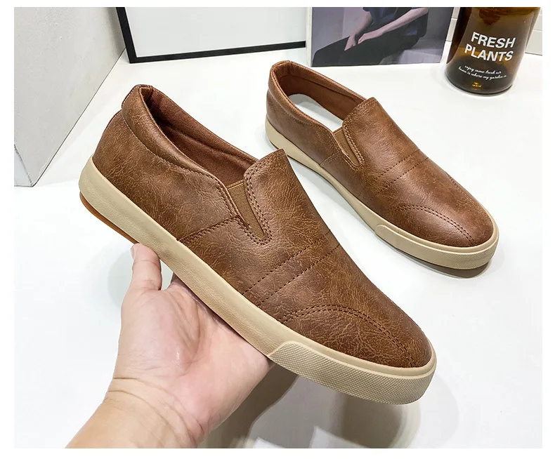 

2021 spring men's shoes PU low-top sneakers solid color increased heel loafers one-foot casual shoes lazy cloth shoes