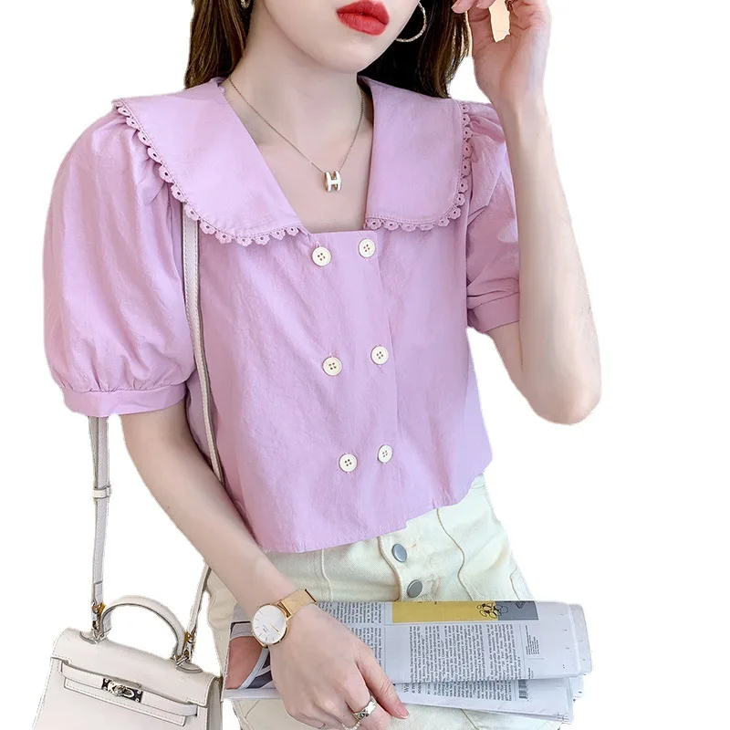

2021 summer new sweet doll collar shirt design French short-sleeved double-breasted solid color top women