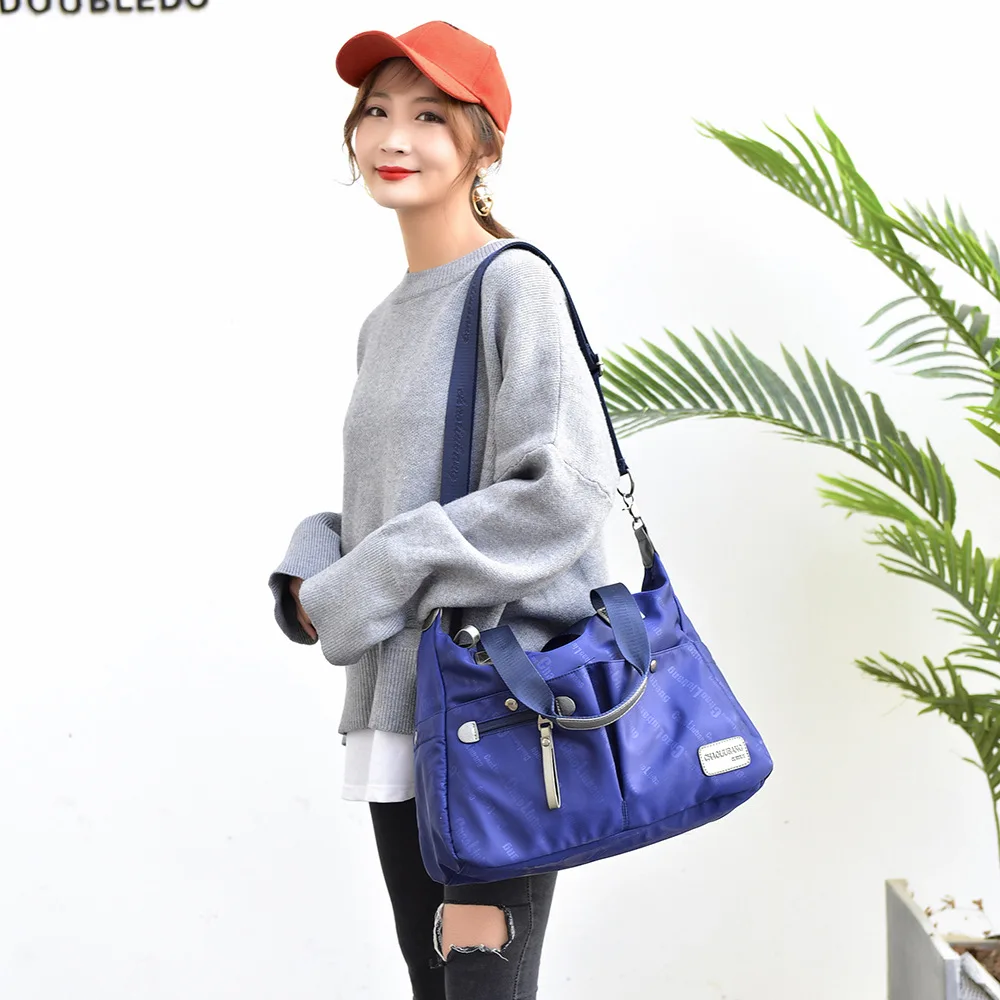 2021 new version of Oxford cloth shoulder bag men and women casual waterproof messenger large capacity fashion simple handbagW34
