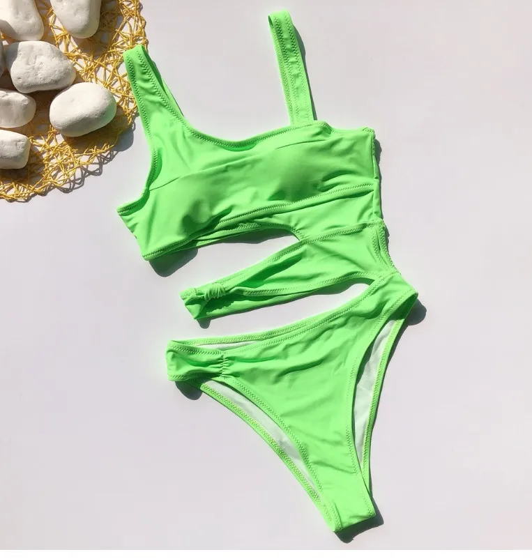 

Hollow tank top one-piece bikini swimsuit with chest pad