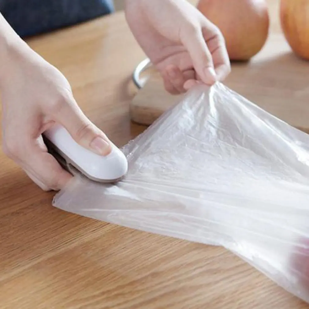 

Portable Manual Mini Sealing Machine Sealer Food Sealing Clip Hand Pressing Open Plastic Bag Simple Operation