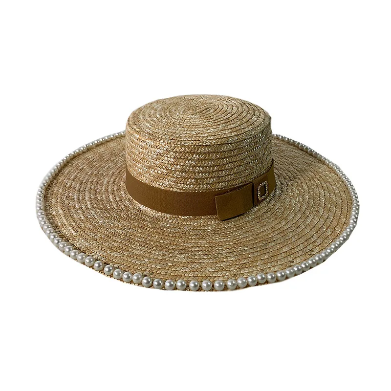 

Summer net red hat female Korean pearl side straw flat top straw hat sunshade holiday beach hat sunscreen sun hat