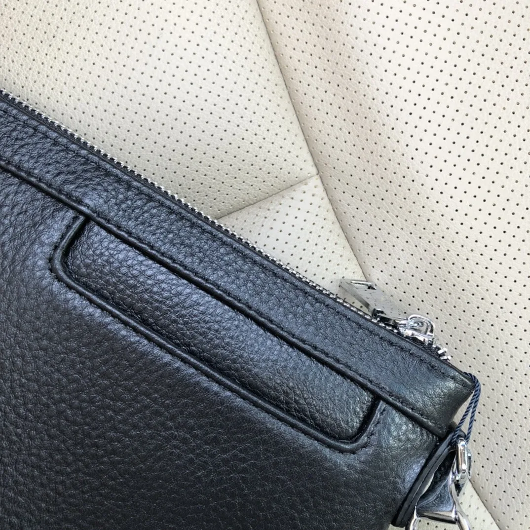 

New leather men and women large-capacity fashion handbag messenger bag clutch