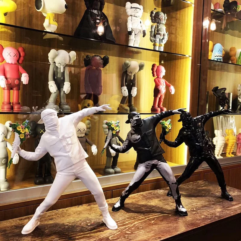 

Flower Bomber Throwing Flower Througher Sculpture