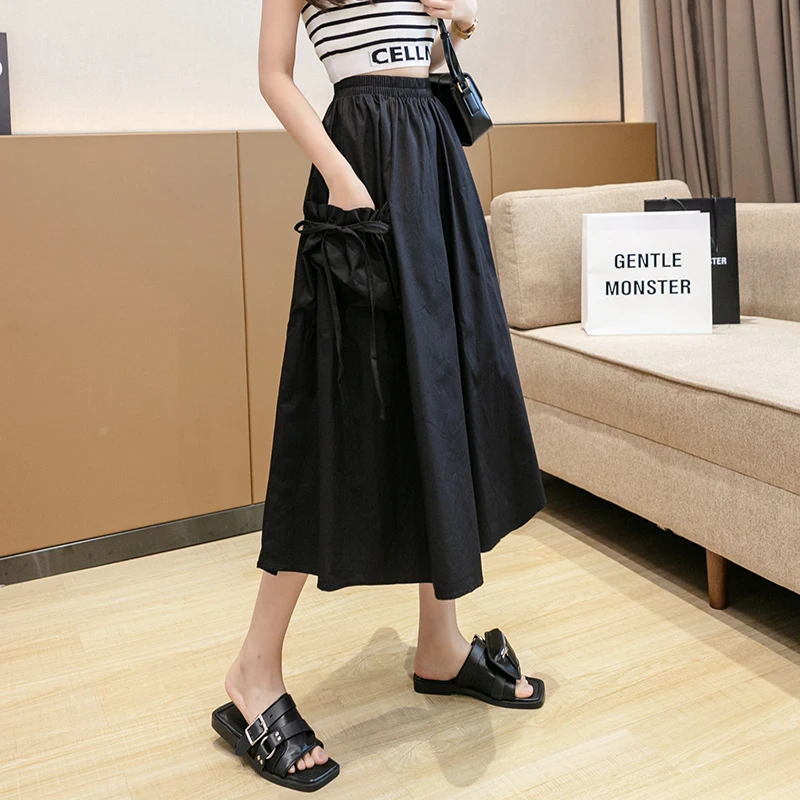 

Skirts Women Solid Color White Black Korean Harajuku Elastic Waist A-line Skirt Woman Spring High-waist Fashion Summer Skirts