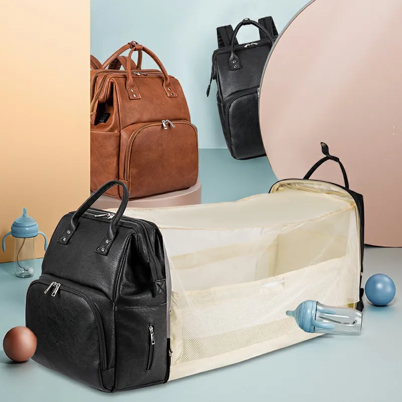 

USB Pu Leather Diaper Bag Large Capacity Baby Backpack Mommy Travel Premium Waterproof Care Bag Multifunctional Baby Bed