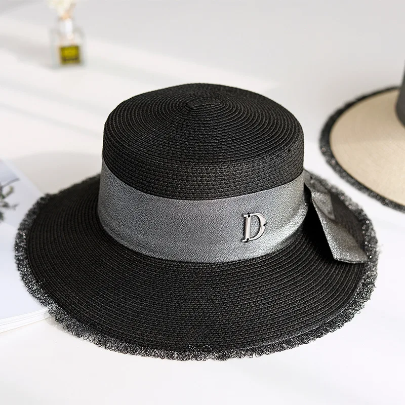 Соломенная шляпа с большим бантом для весны и лета |