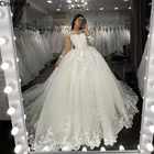 Свадебные платья с длинным рукавом, трапециевидной формы со шлейфом, кружевной аппликацией и кристаллами, свадебные платья со шнуровкой сзади
