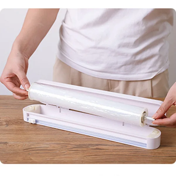 

Suction-cup cling film cutter household division can be adjusted to receive cutting box of creative kitchen tools