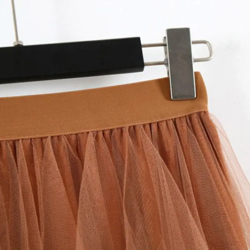 

2019 Women Elastic High Waist Solid Color Irregular Mesh Stitching Wild A-line Long Ladies Casual Skirt