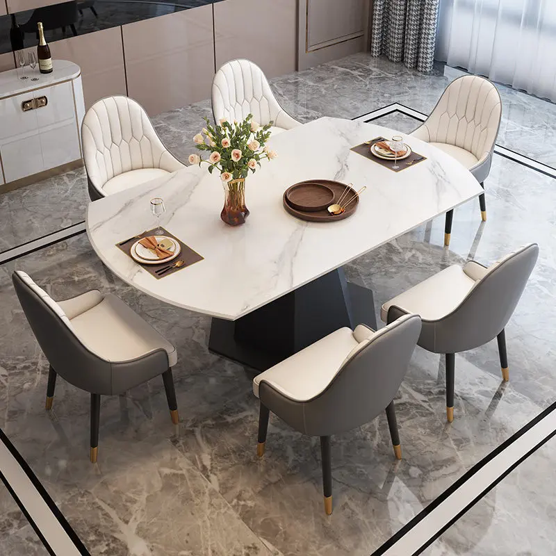 

The slate dining table is round with a retractable rotating circular dining room deformed table