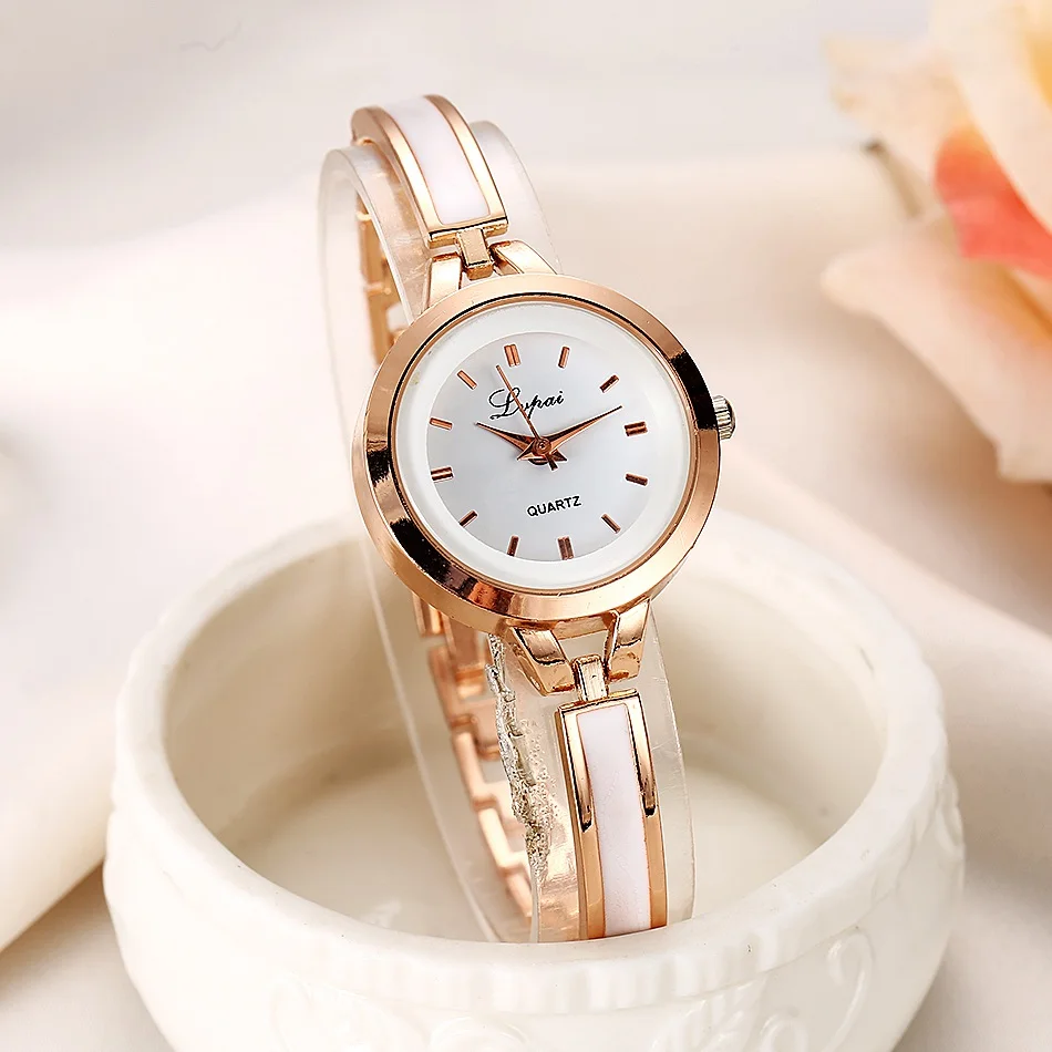 

Women Luxury Rose Gold Silver Bracelet Wristwatch Ladies Alloy Simple Casual Quartz Watches Clock