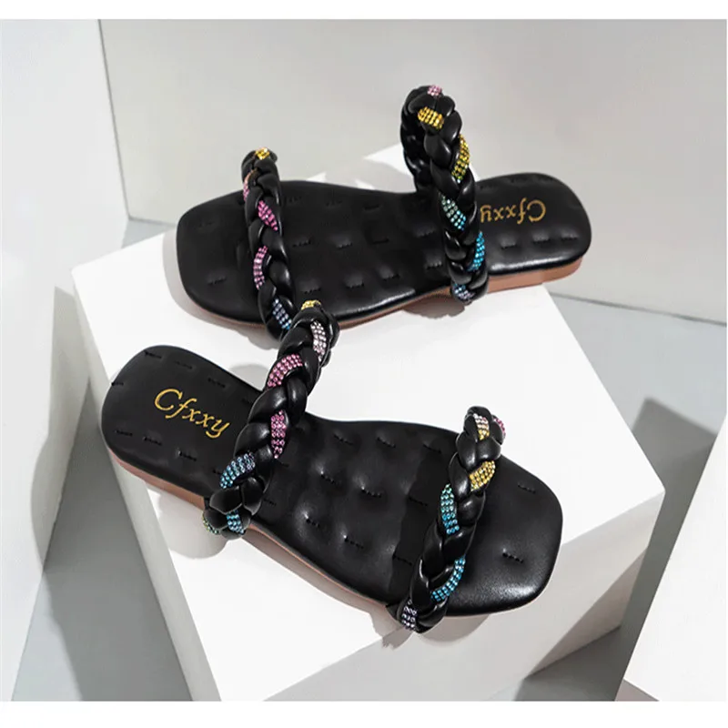 

2021 European and sk American ladies one-word casual flat-heel woven flat slippers 1790