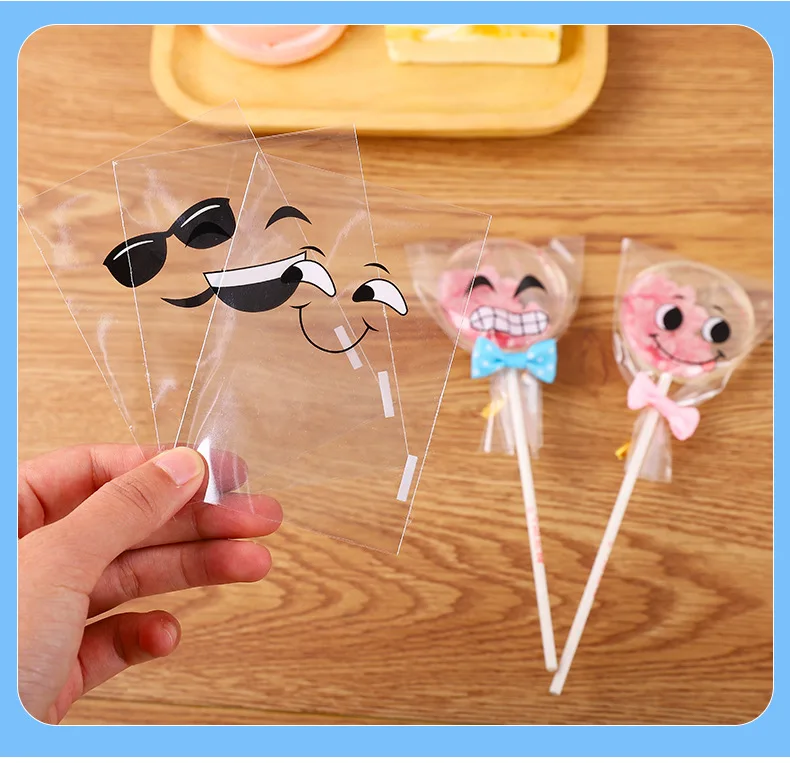 

100pcs/lot clear smiling face plastic bags small cookie packaging bags cupcake wrapper Lollipop packing bag 7x10cm