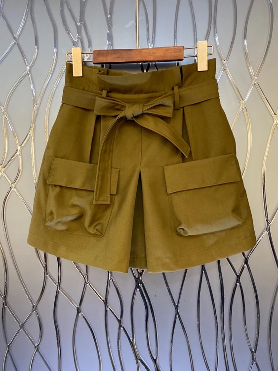 

2021 early spring new fashion women's lace-up knotted waist symmetrical pockets solid color casual A-line shorts 107