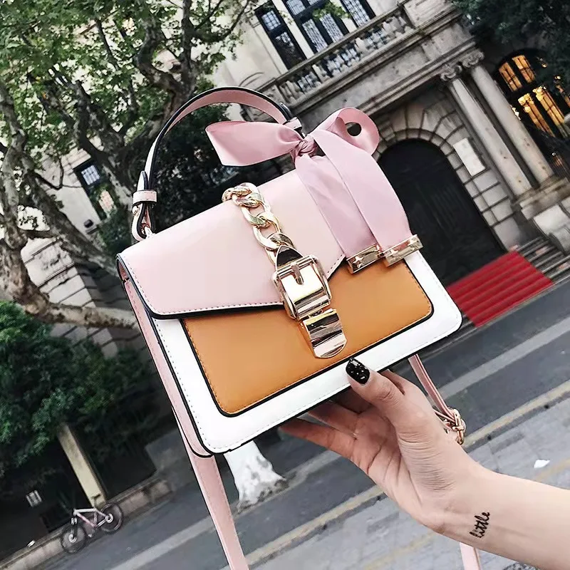 

The new small square bag female 2021 Korean fashion hit color handbag Western style ribbon shoulder messenger bag