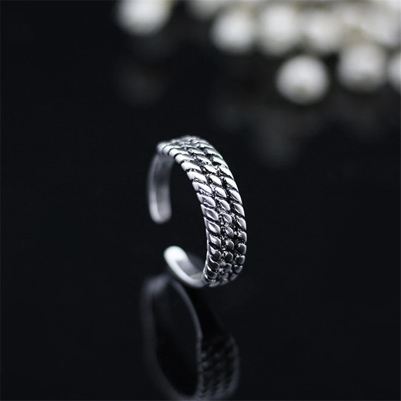 

New personality ring fashion Japan and South Korea retro three-layer twist thread opening trend couple ring food wholesale