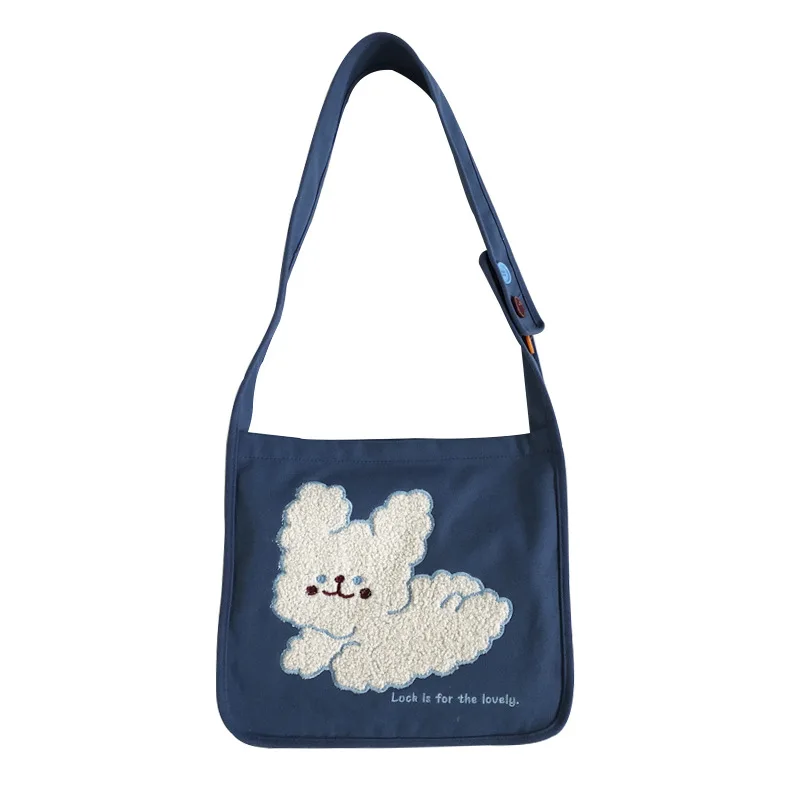 

Tamara Embroidered Canvas Plush Running Dog One Shoulder Messenger Cute Student Casual Canvas Bag New 2021