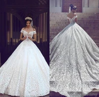 saudi arabic dubai 2020 luxury short sleeves wedding dresses off shoulder appliques backless with sweep train bridal gowns robe