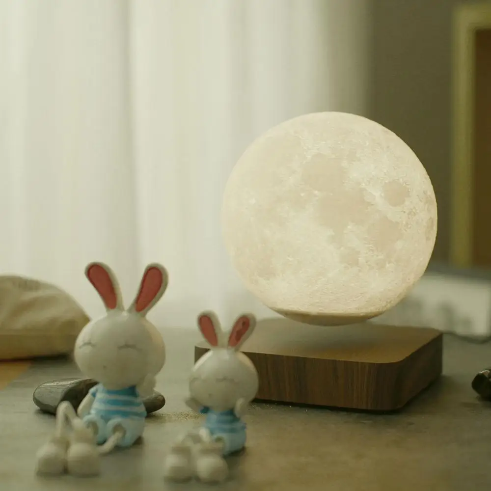 

Creative 3D Magnetic Suspension Moon Night Light Floating and Spinning in Air Freely with Luxury Wooden Base Home Decoration CSV