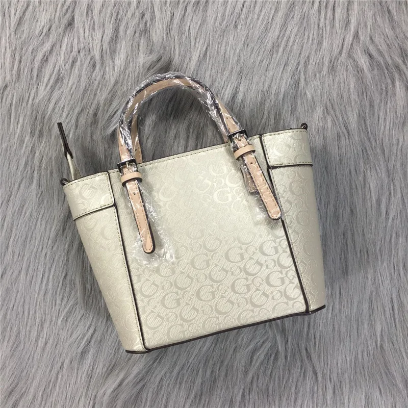 

Women's handbag designer, women's handbag, luxury, with printing barrel, simple, brand name handbag, leather, 2021