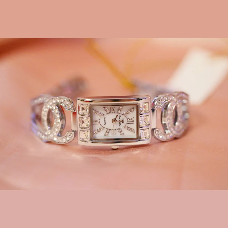 Лидирующий бренд роскошные королевские Золотые женские часы кварцевые ремешок