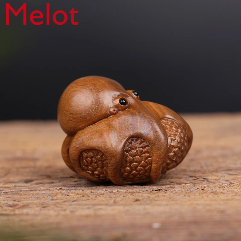 

Guajacwood Wooden Octopus Wealth Comes from Every Direction Hand Pieces Wood Carving Crafts Crafts Small Ornaments