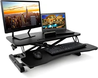 black adjustable folding standing computer and laptop sit stand desk converter workstation with a keyboard tray