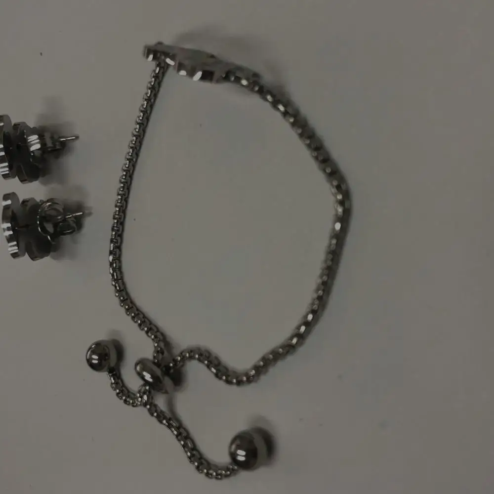 Женский браслет с подвеской подарочный набор сережек цветком из серебра Osito Joyas