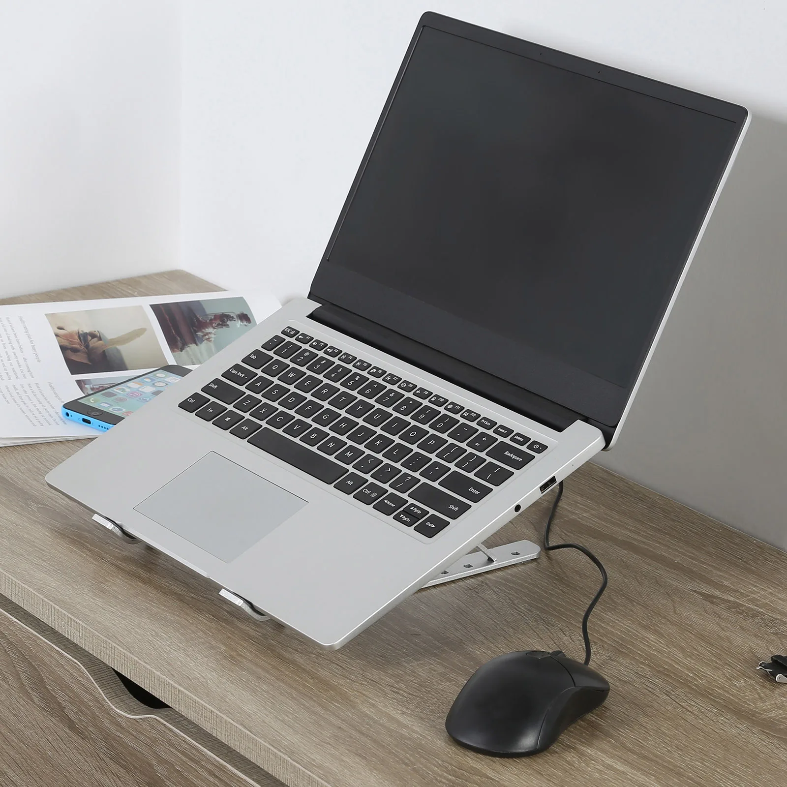 регулируемый держатель для