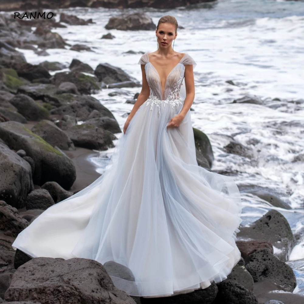 

V-Neck Beach Wedding Dresses 2021 Lace Appliques A-Line Sleeveless Sexy Backless Bridal Gowns With Sweep Train Vestido De Novia