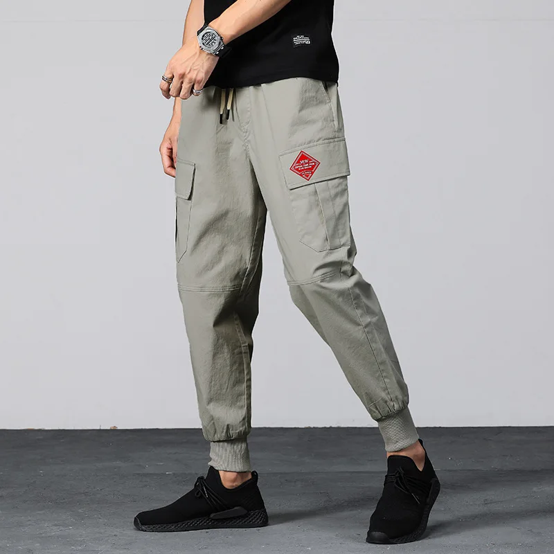 

2018 Trendy Tux Loose Beam Foot Harlan Slacks Tether Elastic Waist Bag Overalls More men's Trousers