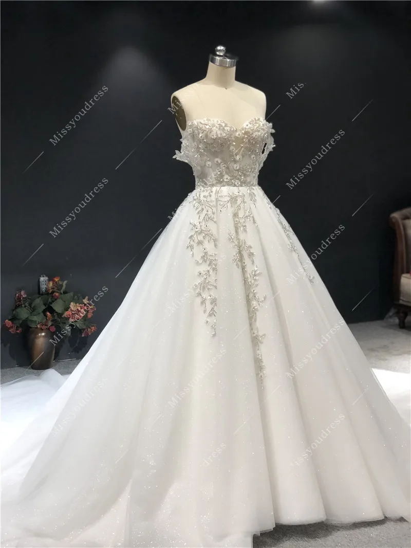 2021 Newest High Quality Real Sample Ivory Sweetheart Strapless A-line Heavy Silver Beadings Floor Length Wedding Dress