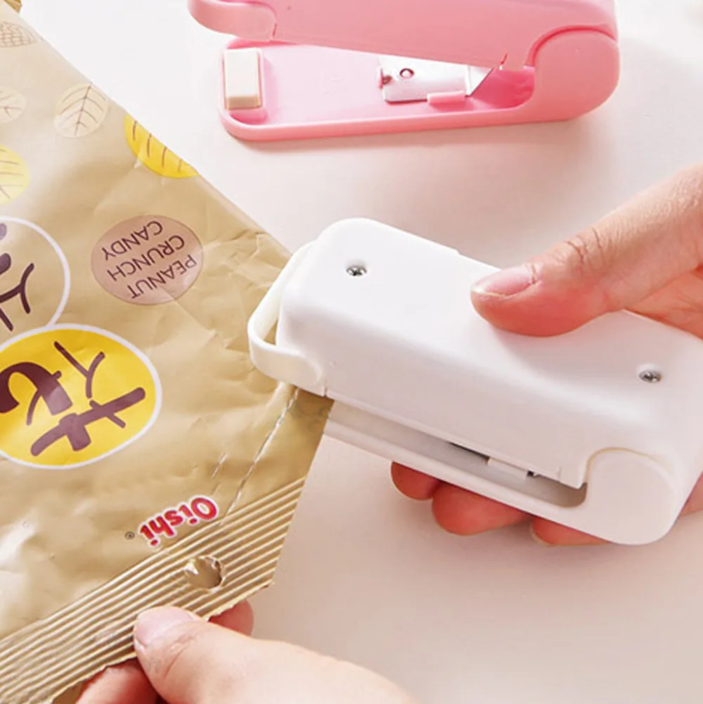 

Portable Sealing Tool Heat Mini Handheld Plastic Bag Impluse Sealer Storage In The Kitchen Home Storage Organization Accessories