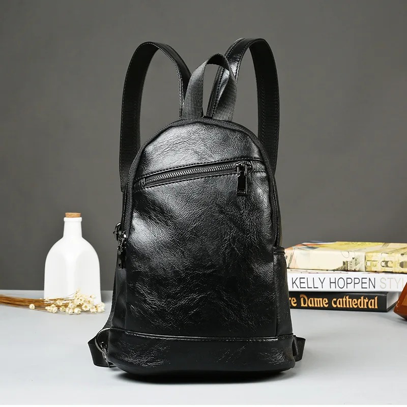 Мужской кожаный рюкзак для школы PUOU черный водонепроницаемый повседневный