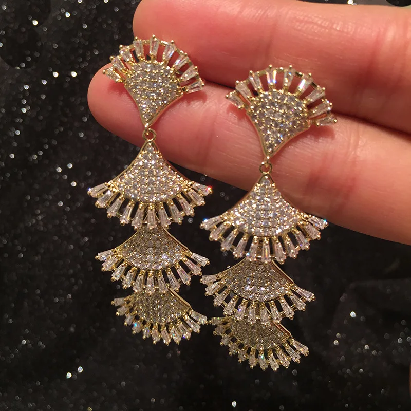 

Fan earrings female long tassel s925 silver modified face super fairy God exaggerated hollow flower tassel earrings