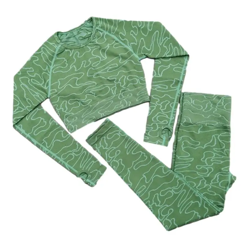 

Yoga Clothes Curved Jacquard Back Hollow Cationic Long Sleeve Top Curved Jacquard Back Hollow Cationic Seamless Long Sleeve