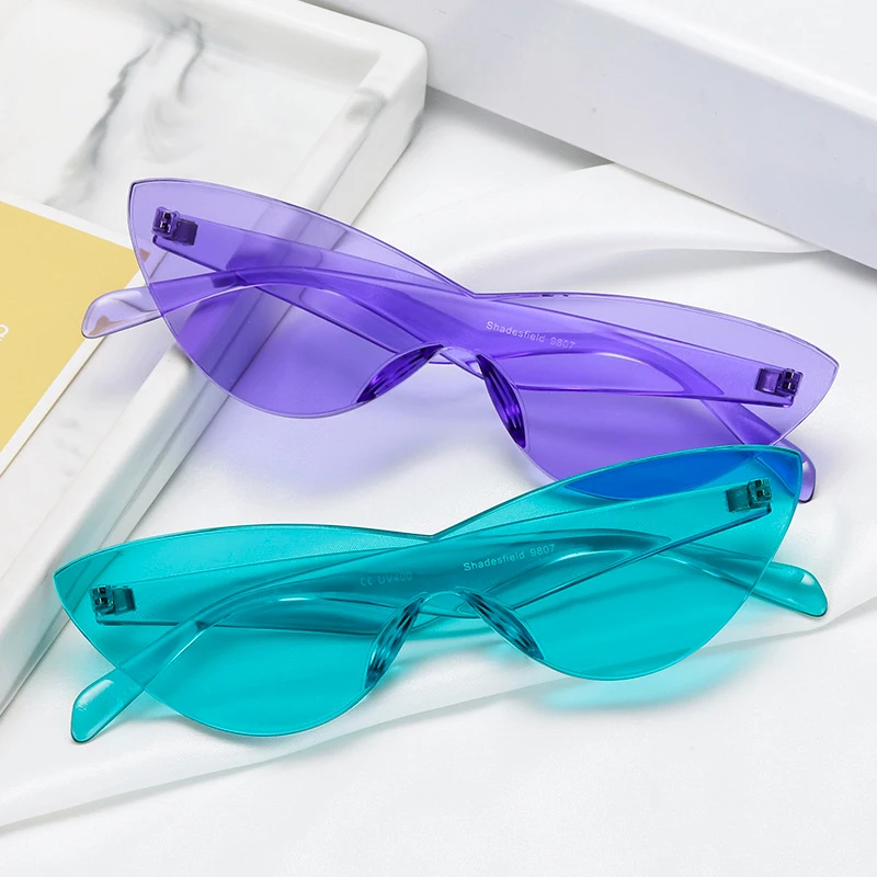 Солнцезащитные очки без оправы кошачий глаз женские модные цельные линзы яркие