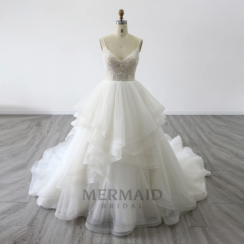 

Spaghetti Straps Sweetheart Open Back Ruffles A Line Wedding Dress