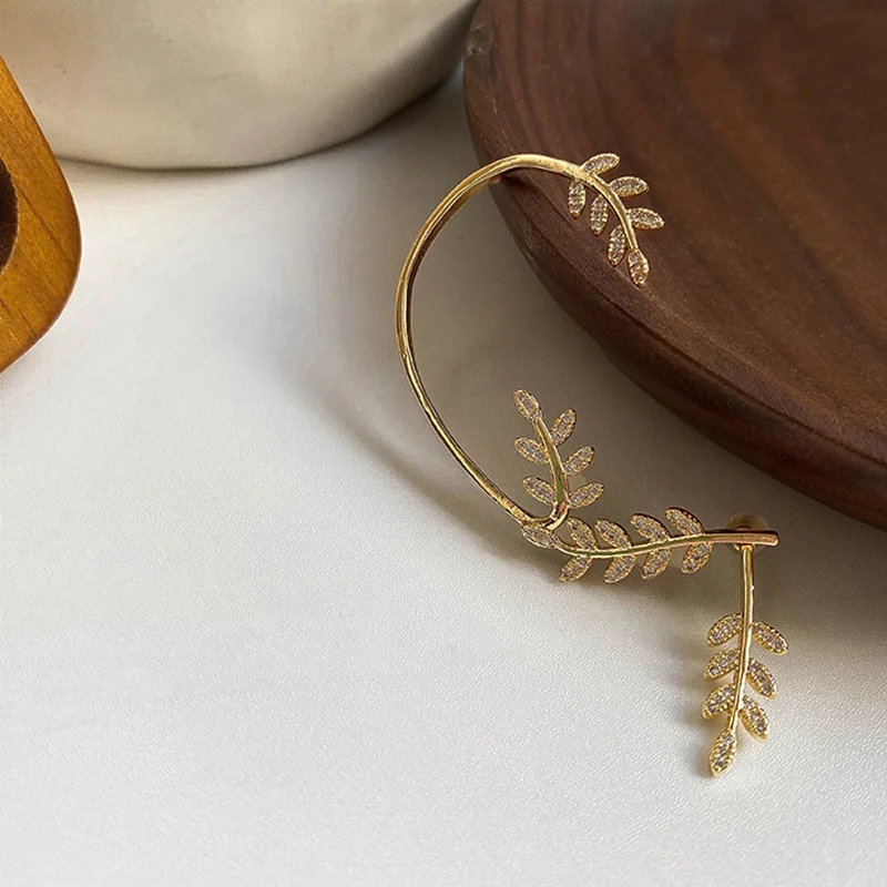 

Origin Summer Unique Design Bling Bling Rhinestone Leaves Clip Earrings for Women Delicate Curved Party Earring Jewelry Gifts