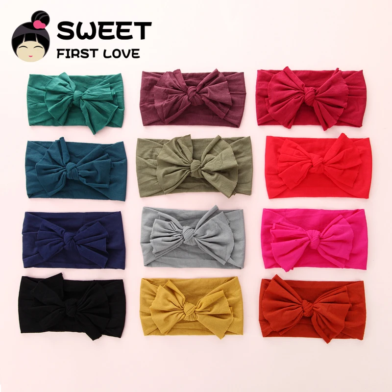 Повязка на голову женская с большим бантом нейлоновая мягкая эластичная лента