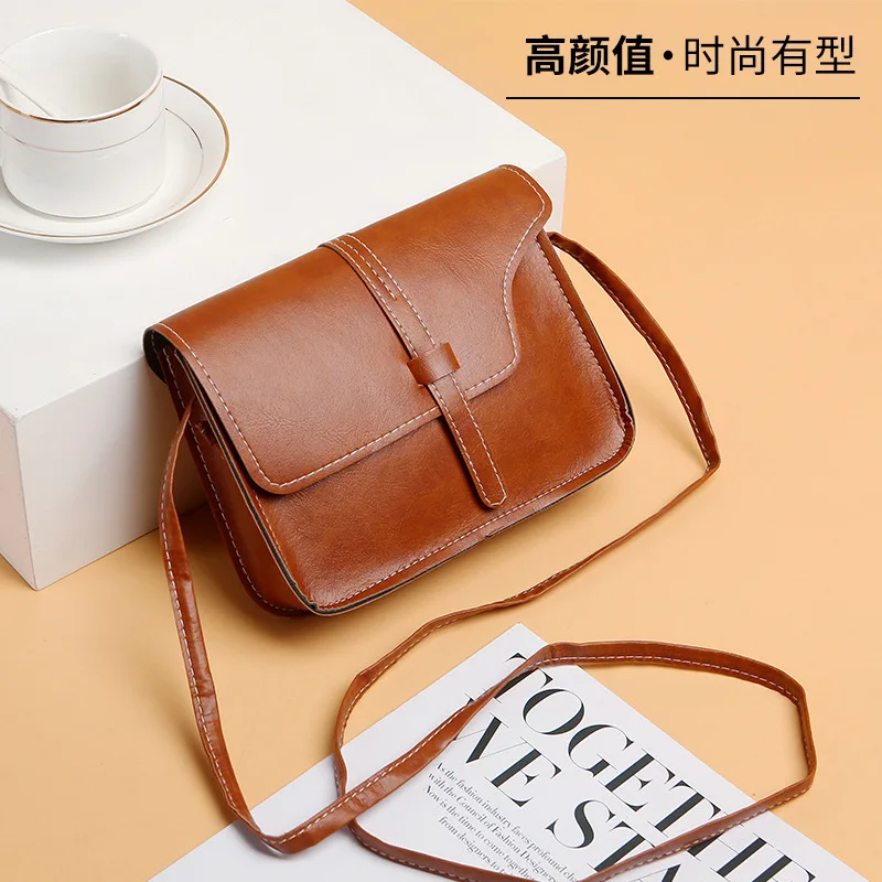 

2021 spring and summer shoulder bag messenger bag solid color simple retro small square bag drawstring bag female