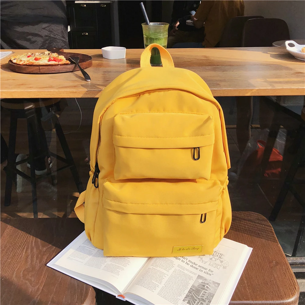 

2019 New Korean Boys Girls Solid Color School Bag Large-capacity Outdoor Backpack Female Wear Oxford Cloth Student Backpack