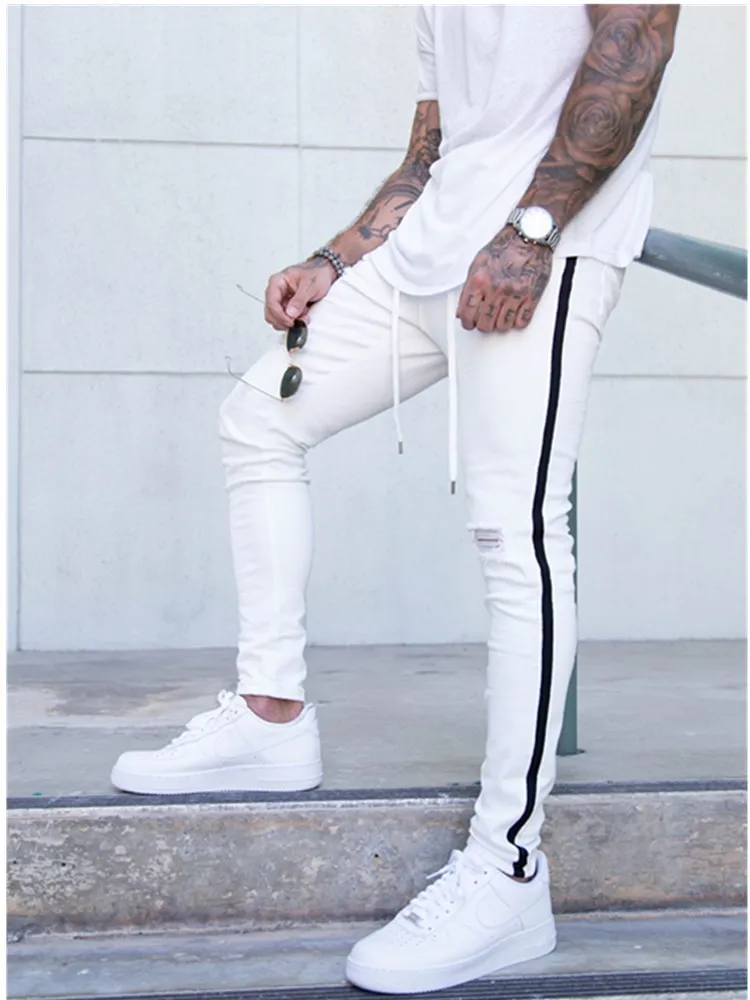 

Мужские облегающие джинсы, байкерские потертые джинсовые рваные брюки-карандаш с боковыми полосками, уличная одежда в стиле хип-хоп, высоко...