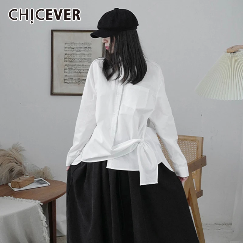 

CHICEVER Solid Belted Button Through Blouse For Women Lapel Collar Long Sleeve Fold Pleated Loose Fashion Woman Blouses 2021 New