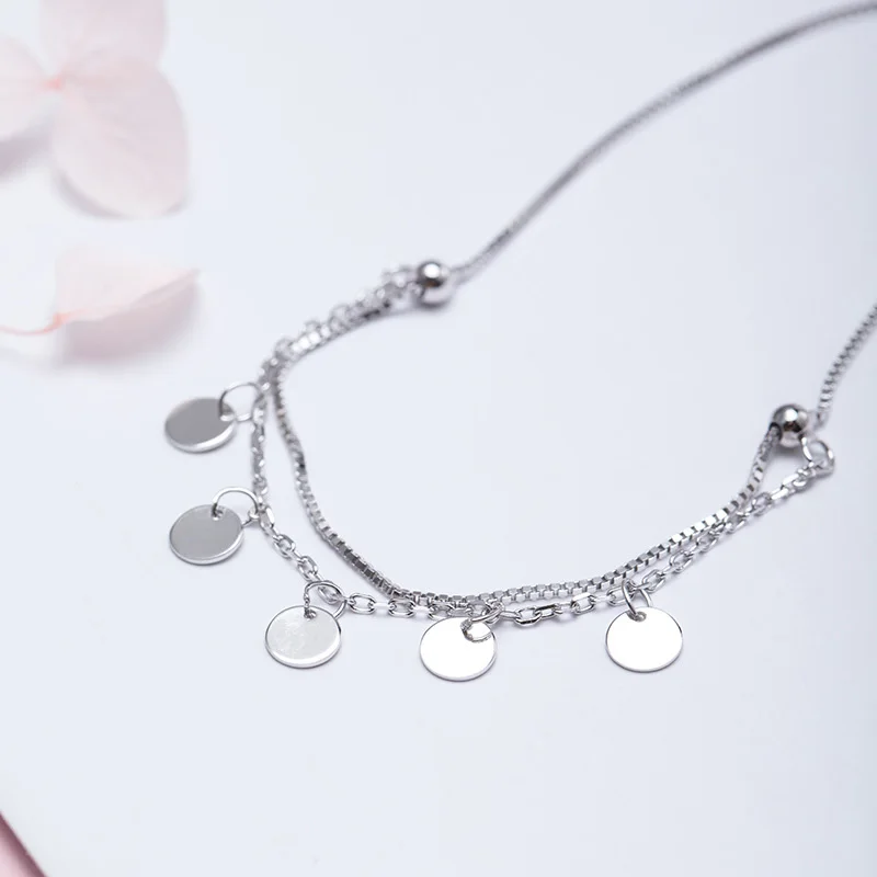 Браслет на ногу женский из серебра 925 пробы с кисточками круглые амулетные