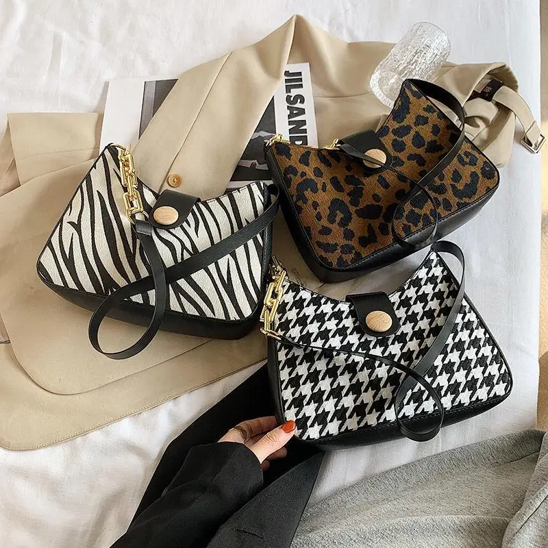 

Joker ladies shoulder armpit bag 2021 new fashion online celebrity niche design zebra crossbody bag